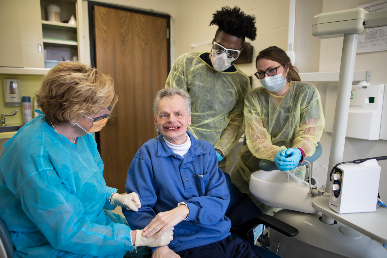 TCDM students assist in patient care at Westchester Institute for Human Development.