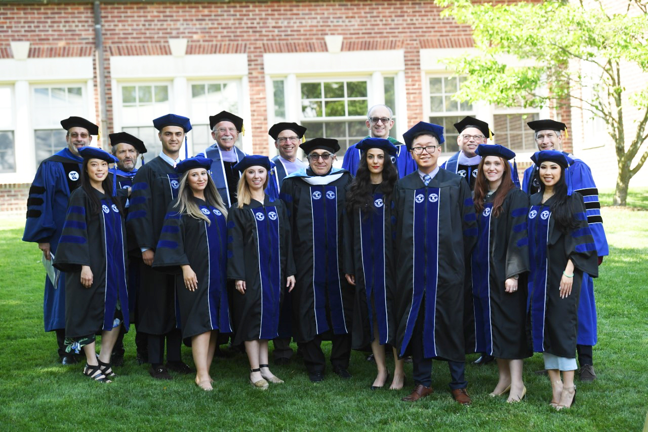 Mr. Stanley M. Bergman (center) with TCDM leadership and graduates from the Class of 2021