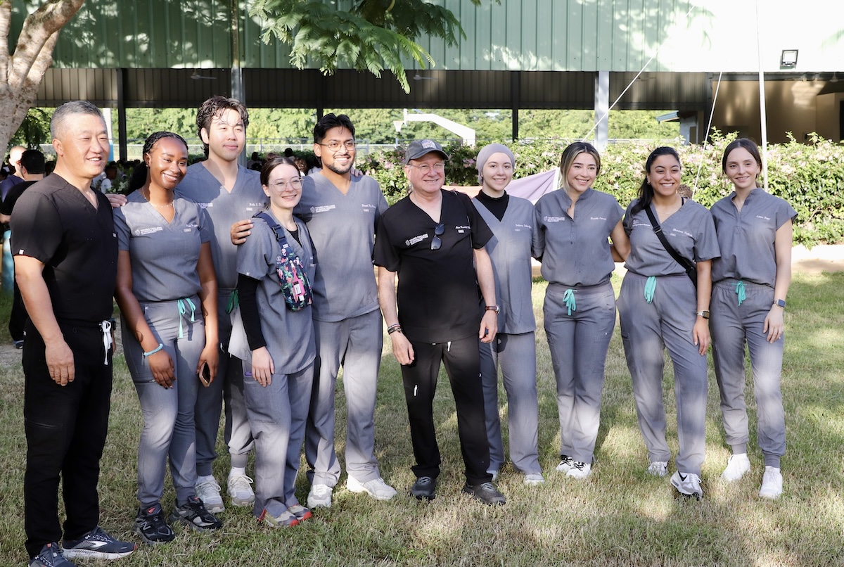 TCDM fourth-year students with by Alan Rosenthal, DMD, Assistant Dean, TCDM Global Health and Community Outreach and Steven Cho, DDS, TCDM Clinical Associate Professor of Dental Medicine.